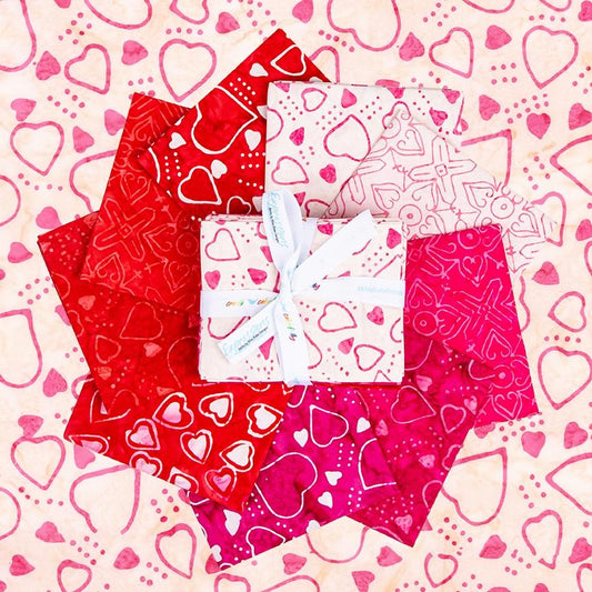 This Fat Quarter precut bundle includes 9 pieces from the Love Punch collection for Riley Blake Designs.