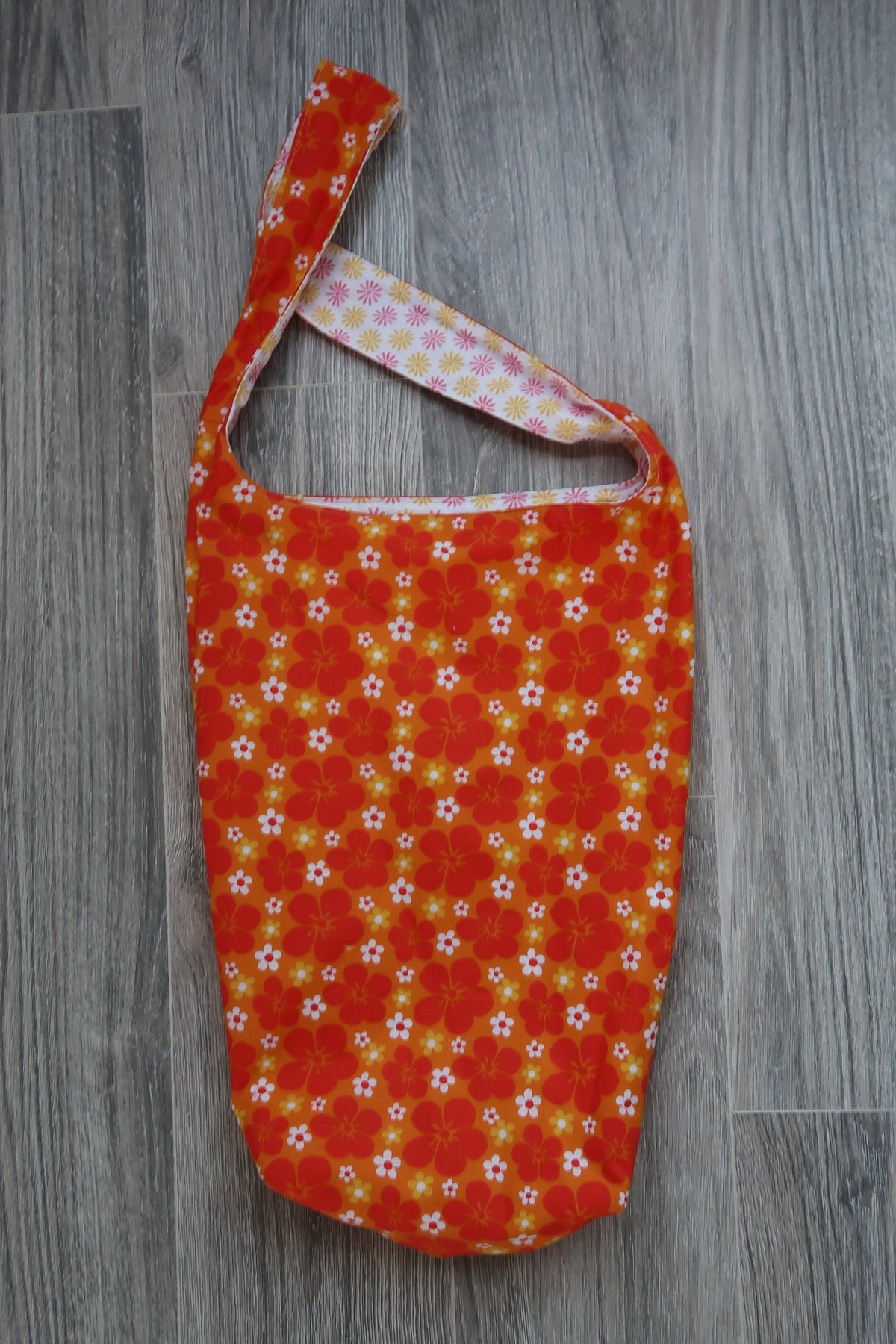 Yoga mat bag, cotton fabric, Light and Dark Orange Floral patterned with a white floral patterned inner lining fabric