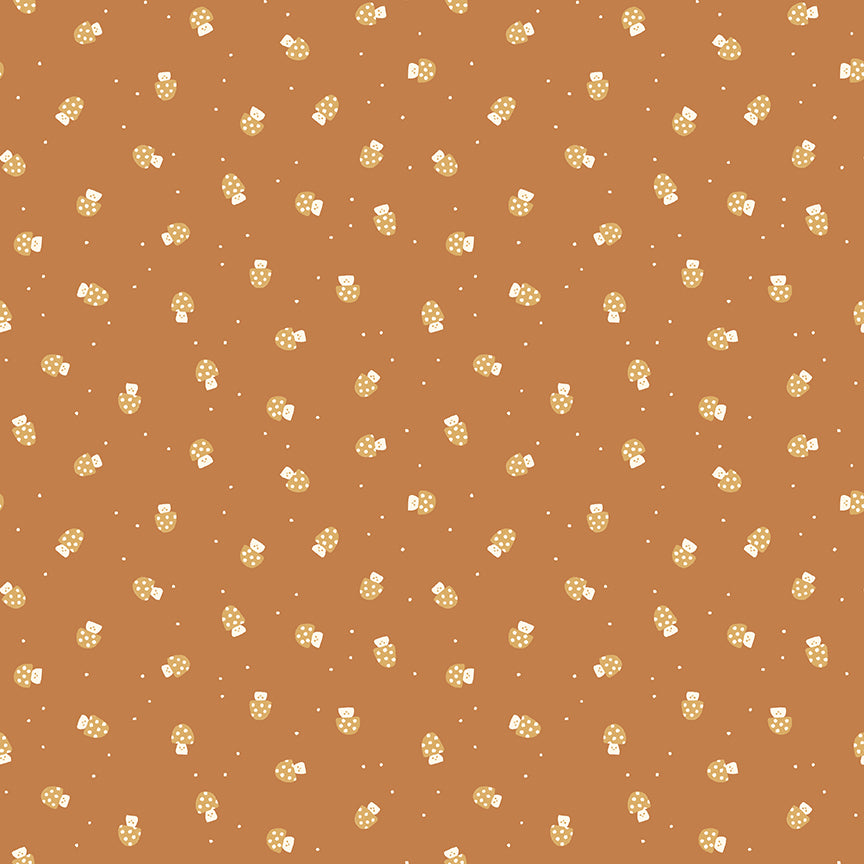 Cotton fabric faraway kingdom fairy tale collection pattern of scattered mushrooms with spotted mushroom caps on a light brown / earth colored background