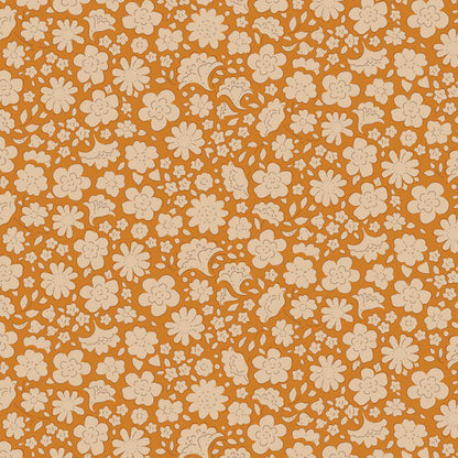 Pattern Carla Saffron: A stylized floral or geometric pattern on a saffron background from The Tilda Creating Memories Autumn collection (part of the Seasonal Basics range) features 16 small-patterned fabrics in warm tones of ginger, saffron, brown, and rust, with touches of blue-grey and khaki. Designed by Tone Finnanger, the collection blends 9 printed and 7 woven cotton designs—including dainty florals, delicate stripes, and timeless plaids—ideal for quilting, softies, and  crafting.