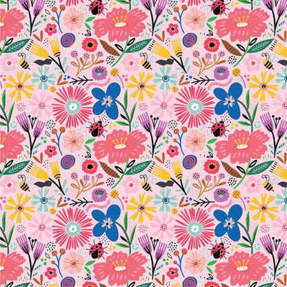 cotton fabric colorful whimsical floral pattern with ladybugs on a pink background