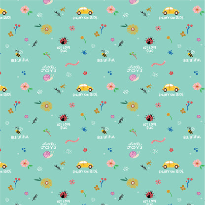 Patterned cotton fabric with punch buggy / love bug cars, flowers, lady bugs and text saying enjoy the ride on a teal background