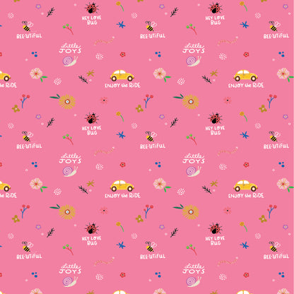 Patterned cotton fabric with punch buggy / love bug cars, flowers, lady bugs and text saying enjoy the ride on a pink background