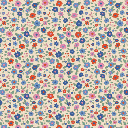 Pattern Evie Blue (130133/1.5.5): A delicate floral print on a light blue ground from The Tilda "Creating Memories" Summer & Ocean Blues collection is designed by Tone Finnanger, featuring a curated selection of 16 fabrics (a mix of prints and wovens) inspired by the sea and summer days. The collection emphasizes blues, white, and hints of ginger/saffron, characterized by small-scale designs like ditsy flowers, stripes, and dots.