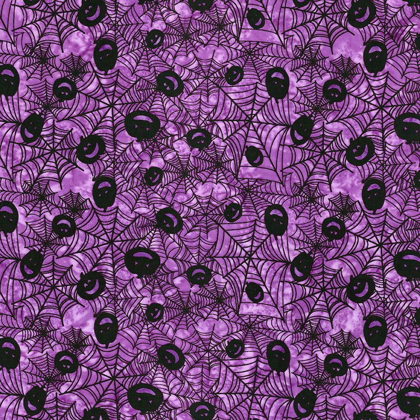 Fabric pattern Glossy grape: hand-stamped spiderweb with jack o lantern faces on a rich purple background from The Whispering Hollows collection which features fun Halloween images, with colors invoking midnight skies, as well as favorite seasonal hues. The Batiks Collections by Riley Blake are produced in state-of-the-art facilities with the best Tjap designers and makers, color experts, and stamp prodigies.