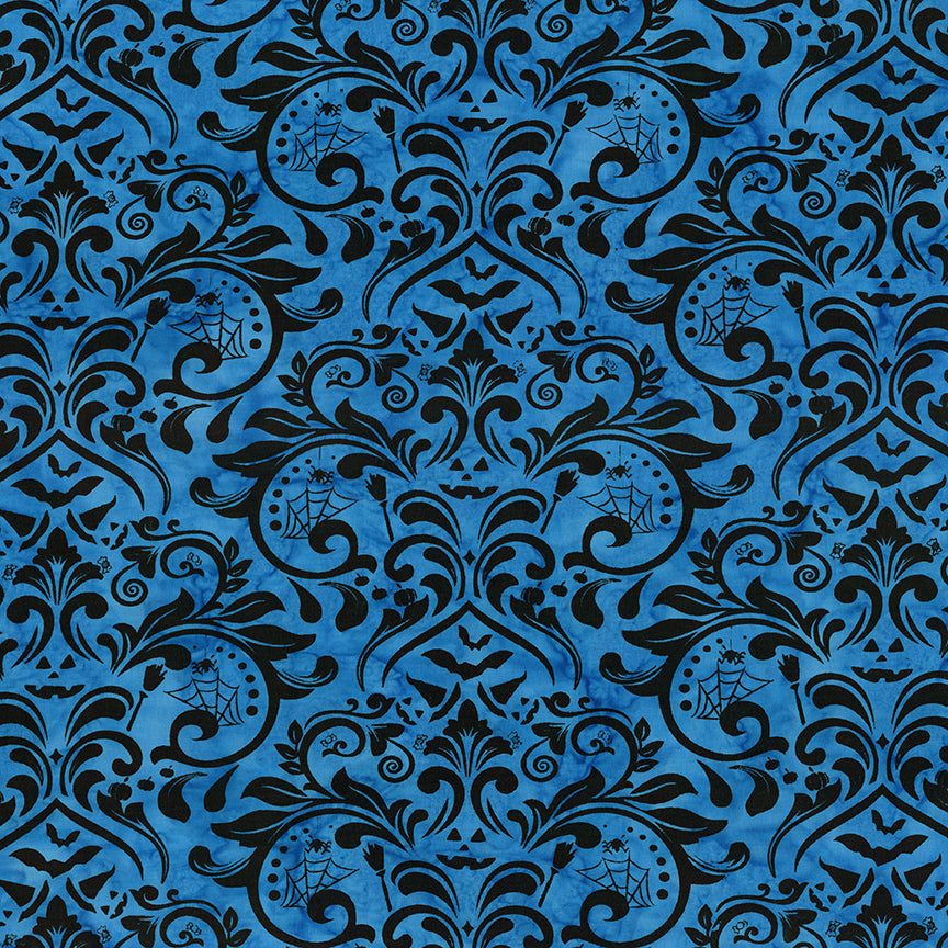 Fabric pattern Dark Skies:  a gothic damask pattern dyed on a rich blue background from The Whispering Hollows collection which features fun Halloween images, with colors invoking midnight skies, as well as favorite seasonal hues. The Batiks Collections by Riley Blake are produced in state-of-the-art facilities with the best Tjap designers and makers, color experts, and stamp prodigies.