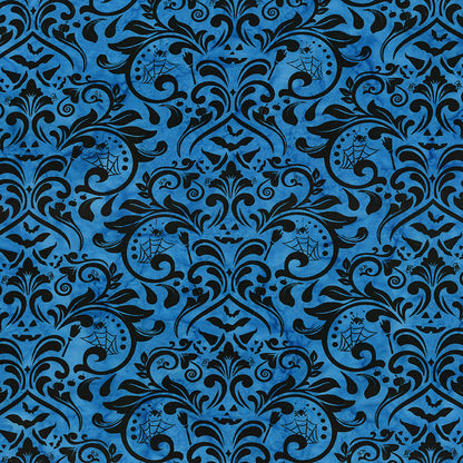 Fabric pattern Dark Skies:  a gothic damask pattern dyed on a rich blue background from The Whispering Hollows collection which features fun Halloween images, with colors invoking midnight skies, as well as favorite seasonal hues. The Batiks Collections by Riley Blake are produced in state-of-the-art facilities with the best Tjap designers and makers, color experts, and stamp prodigies.