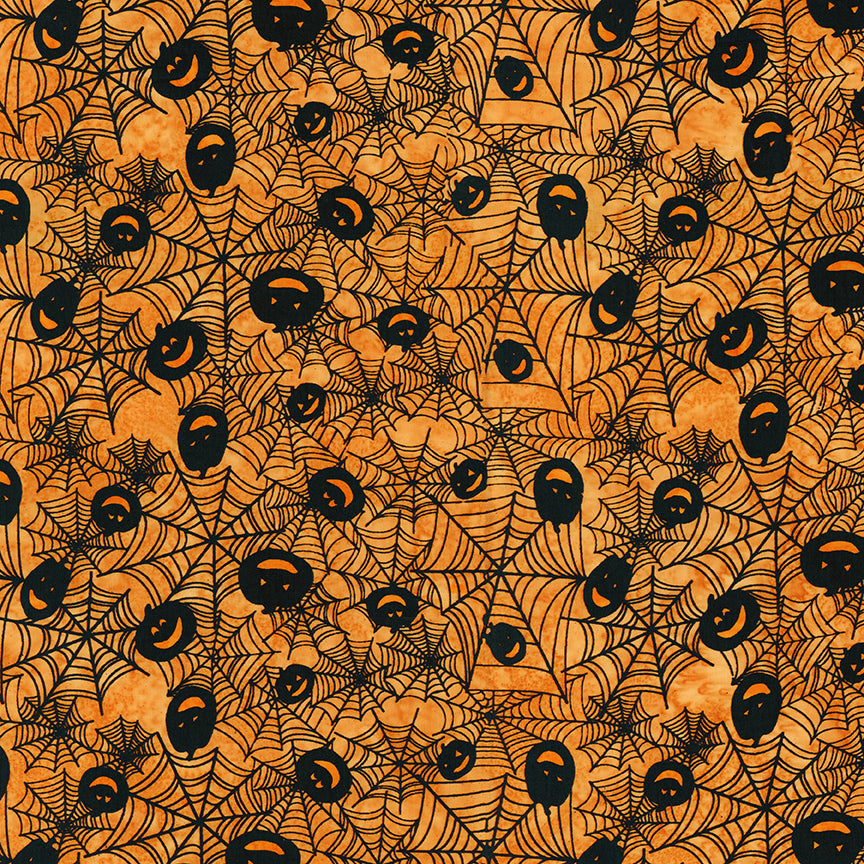 Fabric pattern  Tiger: hand-stamped spiderweb with jack o lantern faces on orange background from The Whispering Hollows collection which features fun Halloween images, with colors invoking midnight skies, as well as favorite seasonal hues. The Batiks Collections by Riley Blake are produced in state-of-the-art facilities with the best Tjap designers and makers, color experts, and stamp prodigies.