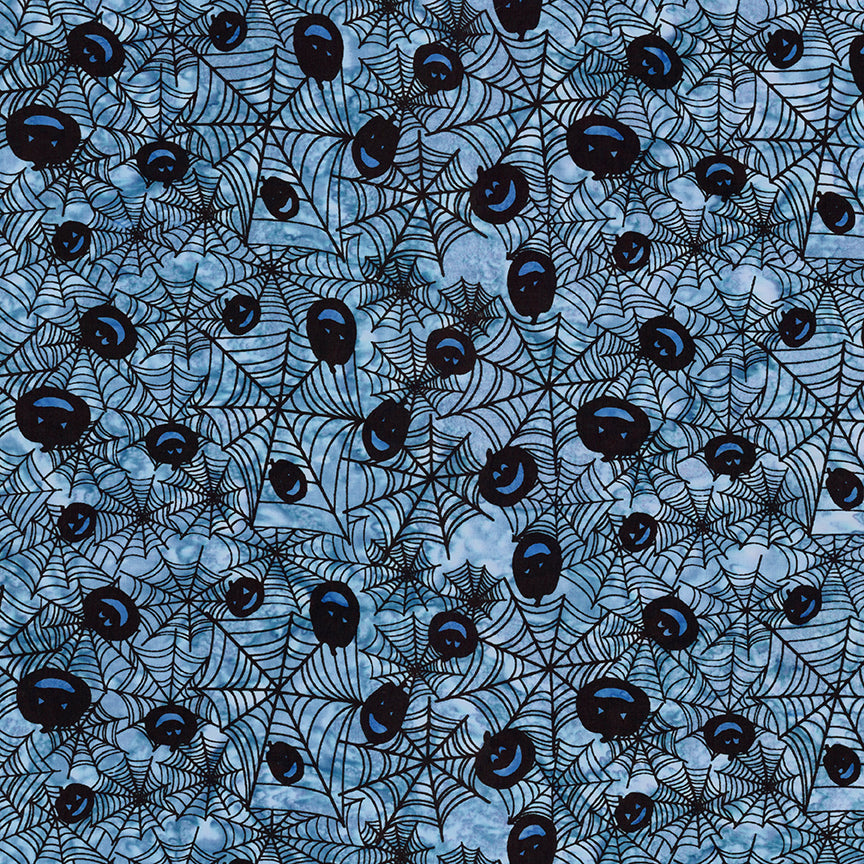 Fabric pattern Dreamcatcher: hand-stamped spiderweb with jack o lantern faces on a blue background from The Whispering Hollows collection which features fun Halloween images, with colors invoking midnight skies, as well as favorite seasonal hues. The Batiks Collections by Riley Blake are produced in state-of-the-art facilities with the best Tjap designers and makers, color experts, and stamp prodigies.