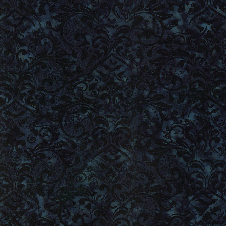 Fabric pattern Raven:  a gothic damask pattern dyed on dark background from The Whispering Hollows collection which features fun Halloween images, with colors invoking midnight skies, as well as favorite seasonal hues. The Batiks Collections by Riley Blake are produced in state-of-the-art facilities with the best Tjap designers and makers, color experts, and stamp prodigies.