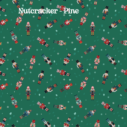 Fabric pattern Nutcracker Toss Pine: A continuous scatter of classic nutcracker soldier figures intertwined with delicate falling snowflakes and miniature pine trees, Colors: Pine, Snow, Sugar from The Nutcracker Tradition fabric collection is designed by Jennifer Long of Sew A Story for Riley Blake Designs. Inspired by the classic Christmas Eve ballet with beloved characters like the Nutcracker, Clara, the Mouse King, and the Sugar Plum Fairy.