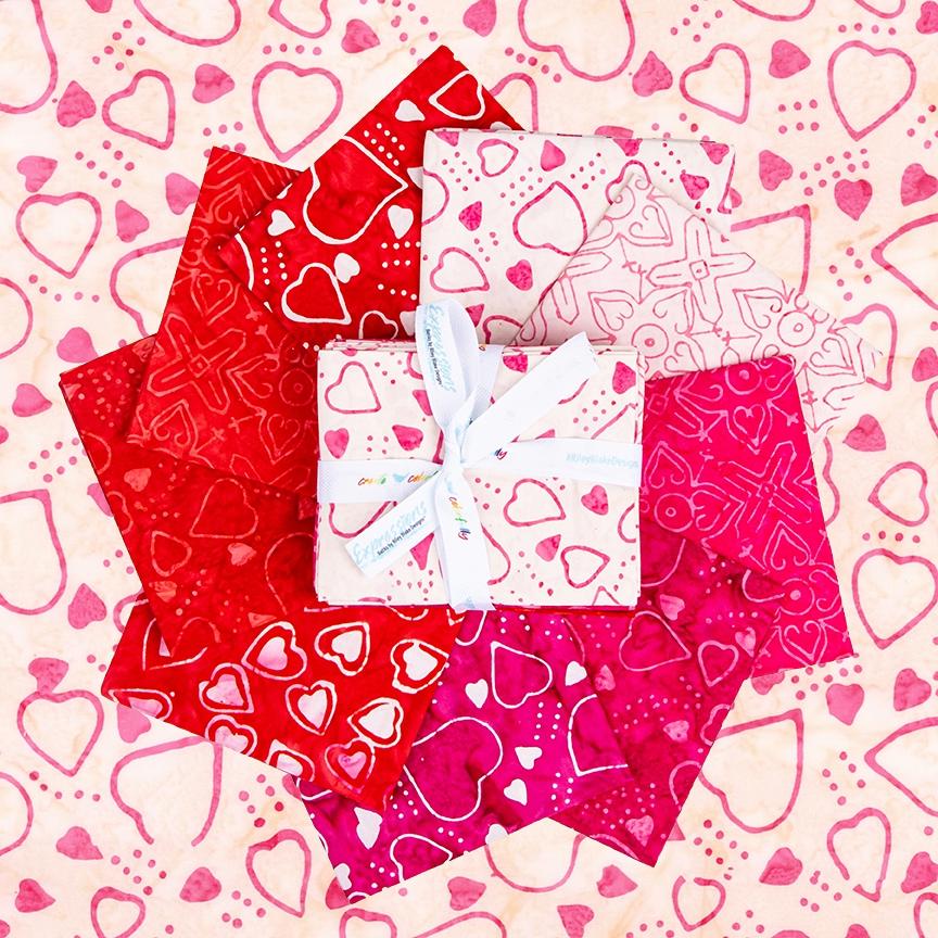This Fat Quarter precut bundle includes 9 pieces from the Love Punch collection for Riley Blake Designs. 
