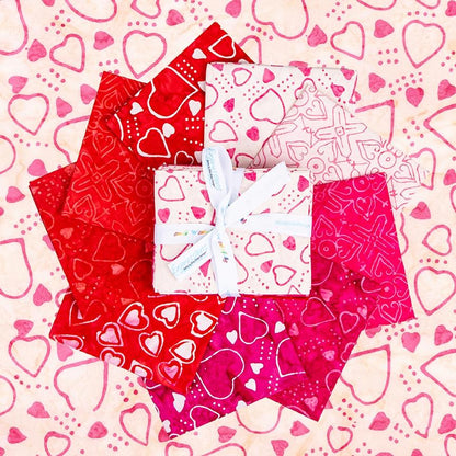 This Fat Quarter precut bundle includes 9 pieces from the Love Punch collection for Riley Blake Designs. 