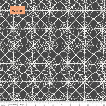 Spider web pattern fabric with 'webs' label on a gray background