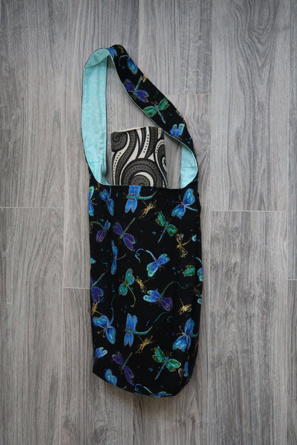 yoga mat bag Black fabric with colorful dragonfly pattern , interior lining is light floral pattern