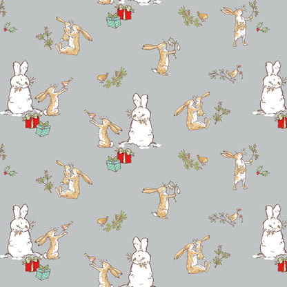 Pattern Bunnies Scenes Gray from The Guess How Much I Love You 2026 fabric collection by Anita Jeram for Clothworks Fabrics features a cozy, Christmas-themed holiday twist. It centers around Big Nutbrown Hare and Little Nutbrown Hare. The collection includes holiday motifs like bunny-snowmen, mistletoe, holly, and winter scenes.