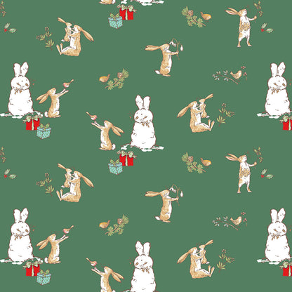 Pattern Bunnies Scenes Green from The Guess How Much I Love You 2026 fabric collection by Anita Jeram for Clothworks Fabrics features a cozy, Christmas-themed holiday twist. It centers around Big Nutbrown Hare and Little Nutbrown Hare. The collection includes holiday motifs like bunny-snowmen, mistletoe, holly, and winter scenes.