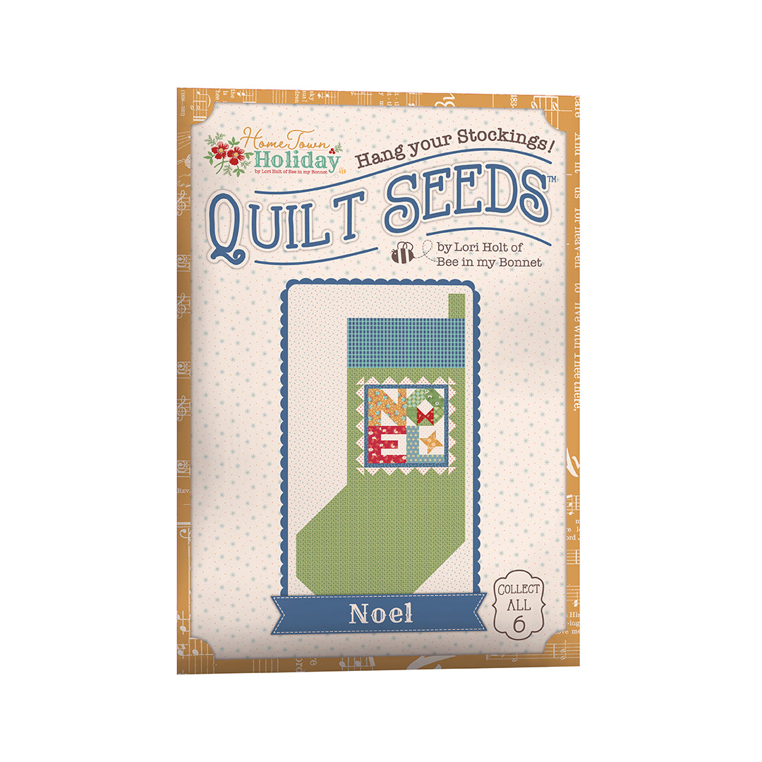 The Home Town Holiday Quilt Seeds™ Patterns by Lori Holt of Bee in my Bonnet is a pattern series for 6 different stocking quilt blocks. Each seed packet has instructions to make 1 block – all you have to do is add fabric. A paper pattern is included in each packet. No templates are required. Each block finishes at 22" x 40" and uses traditional piecing techniques.  Tutorial available You Tube Lori Holt  the Home Town Holiday Quilt Seeds™   Seed packet size is approximately 6 1/2" x 9 1/2".