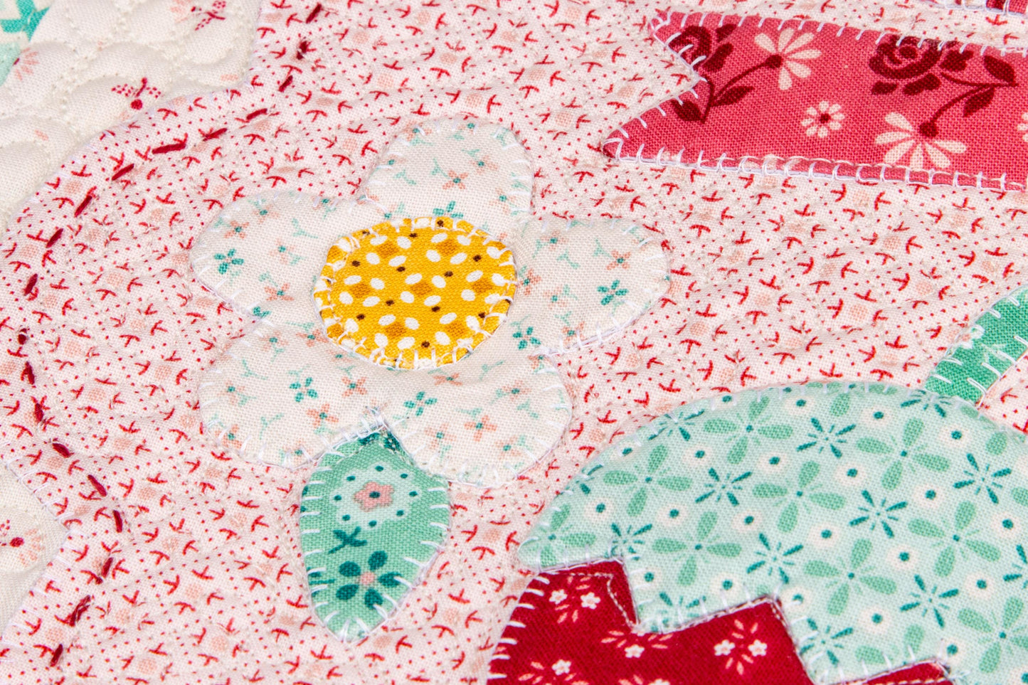 The Strawberry Crush Sew Along Quilt Kit includes the Strawberry Crush Sew Simple Shapes™ and fabric for quilt top and binding. Backing not included. Fabric featured is Berry & Sage by Lori Holt of Bee in my Bonnet. Pattern is also by Lori Holt. Finished size is 66 1/2" x 73 1/2". 
Kit comes in a strawberry-shaped box. Box size is approximately 13 1/2" x 11 3/4" x 3 1/4". 

The Sew Along Guide is included in the  kit but you can also go to Lori Holt's blog A Bee in my Bonnet.