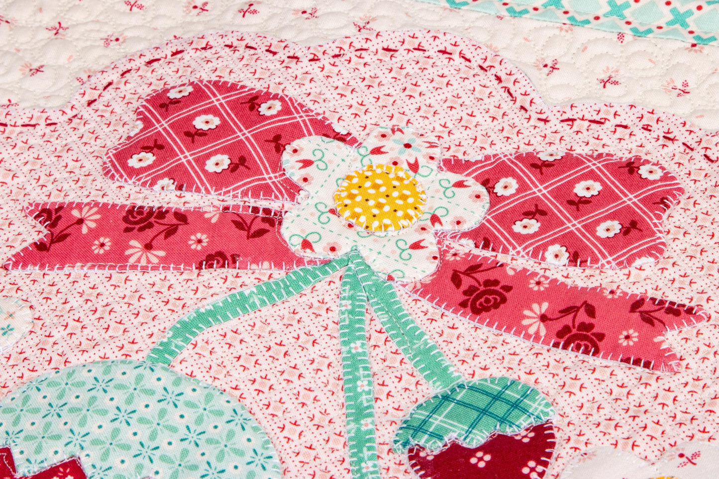 The Strawberry Crush Sew Along Quilt Kit includes the Strawberry Crush Sew Simple Shapes™ and fabric for quilt top and binding. Backing not included. Fabric featured is Berry & Sage by Lori Holt of Bee in my Bonnet. Pattern is also by Lori Holt. Finished size is 66 1/2" x 73 1/2". 
Kit comes in a strawberry-shaped box. Box size is approximately 13 1/2" x 11 3/4" x 3 1/4". 

The Sew Along Guide is included in the  kit but you can also go to Lori Holt's blog A Bee in my Bonnet.