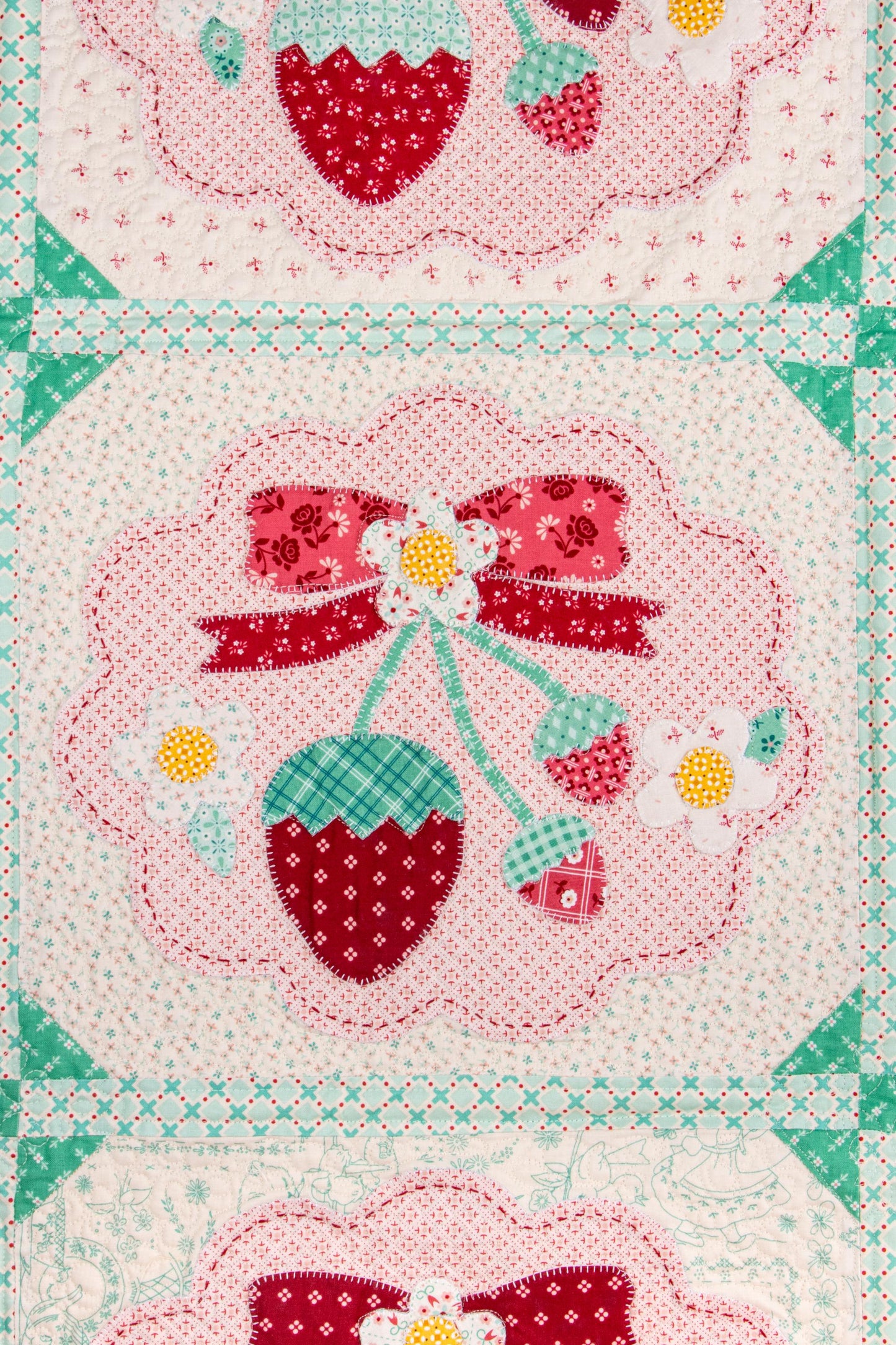 The Strawberry Crush Sew Along Quilt Kit includes the Strawberry Crush Sew Simple Shapes™ and fabric for quilt top and binding. Backing not included. Fabric featured is Berry & Sage by Lori Holt of Bee in my Bonnet. Pattern is also by Lori Holt. Finished size is 66 1/2" x 73 1/2". 
Kit comes in a strawberry-shaped box. Box size is approximately 13 1/2" x 11 3/4" x 3 1/4". 

The Sew Along Guide is included in the  kit but you can also go to Lori Holt's blog A Bee in my Bonnet.