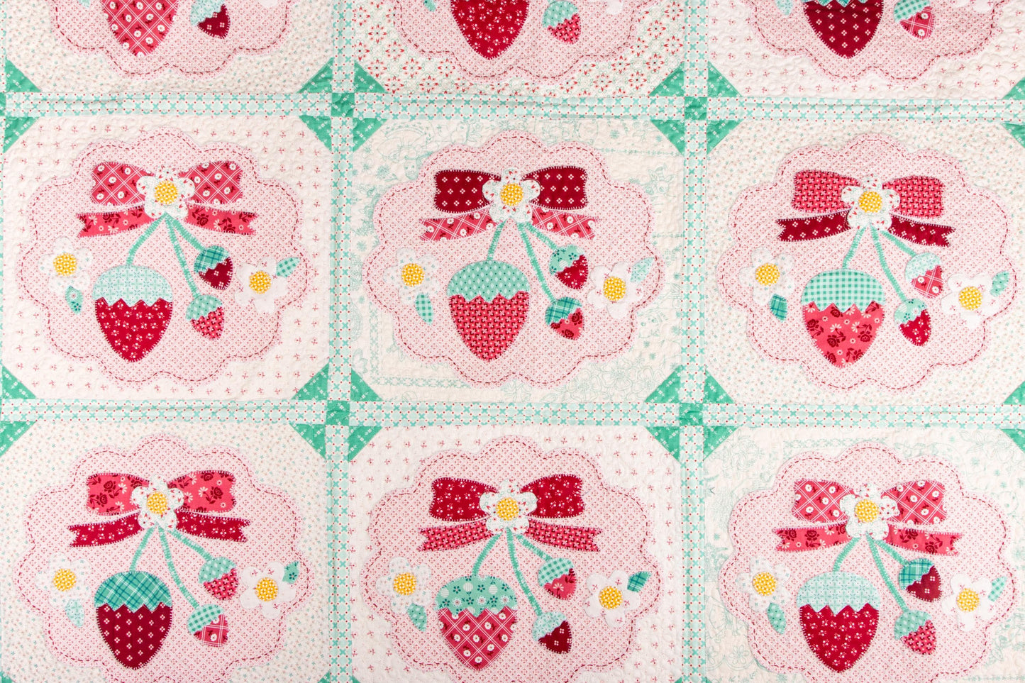 The Strawberry Crush Sew Along Quilt Kit includes the Strawberry Crush Sew Simple Shapes™ and fabric for quilt top and binding. Backing not included. Fabric featured is Berry & Sage by Lori Holt of Bee in my Bonnet. Pattern is also by Lori Holt. Finished size is 66 1/2" x 73 1/2". 
Kit comes in a strawberry-shaped box. Box size is approximately 13 1/2" x 11 3/4" x 3 1/4". 

The Sew Along Guide is included in the  kit but you can also go to Lori Holt's blog A Bee in my Bonnet.