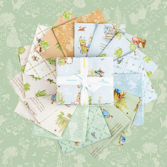 This Fat Quarter precut bundle includes 15 pieces from the The Peter Rabbit™ & Benjamin Bunny™ collection for Riley Blake Designs. This print features a floral lattice with Peter Rabbit, Benjamin Bunny, and friends. Official licensed product. BEATRIX POTTER™. 
- 18"x22"