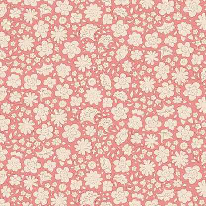 The Carla Pink fabric is a key print from Tilda Fabrics special edition Creating Memories Spring collection which includes a Spring and Easter Pastels color story. This particular design features a traditional floral motif of small white flowers set against a soft pink background. 