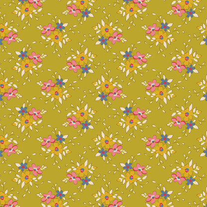 The Frida Lime fabric is a key piece in the Spring and Easter Pastels color story from Tilda's Creating Memories Spring collection. This specific print features an organic pattern of pink, yellow, and blue flower clusters with cream leaf accents on a vibrant lime or pea-green background.
