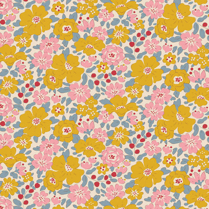 The Harper Yellow floral fabric is part of the Tilda Creating Memories Spring collection, a 2024 special edition release. This specific print features a ditsy wildflower pattern with small yellow and pink flowers, blue leaves, and rich red berries on a soft white background