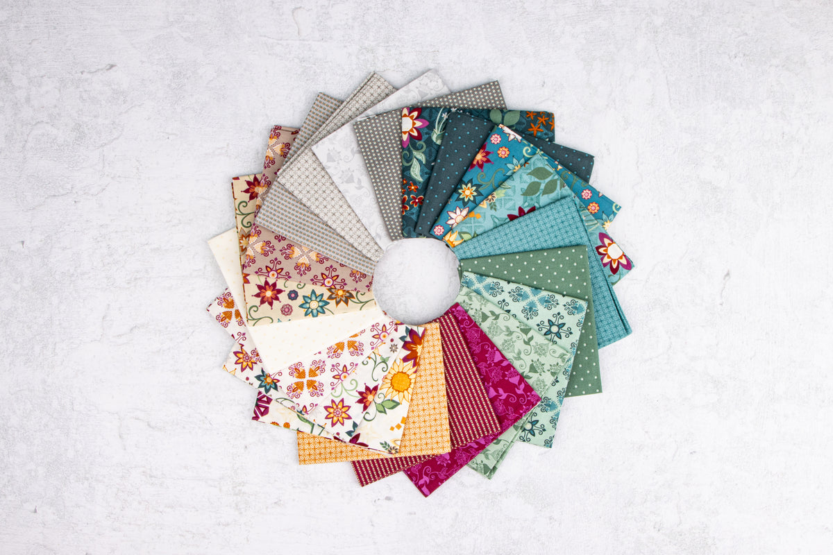 This 5" Stacker precut bundle includes 42 pieces from the Where the Wild Flowers Are fabric collection, flower and garden inspired patterns, by Judi Madsen for Riley Blake Designs. Each print will be included 2 times in the bundle.