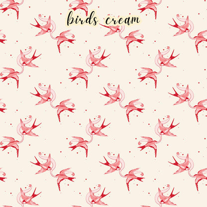 fabric collection Letters to Cupid, 100% cotton, the birds Cream pattern is a pair of red and pink love birds with a ribbon on a creme background 