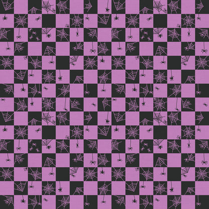 Tricks and Treat 100 cotton fabric collection, this pattern is Cobweb Checker - Purple: A checkered pattern overlaid with cobwebs in shades of purple.  The collection is designed in a style that is "spooky but sweet" and is printed on 100% premium cotton, making it suitable for quilts and crafty Halloween projects.
