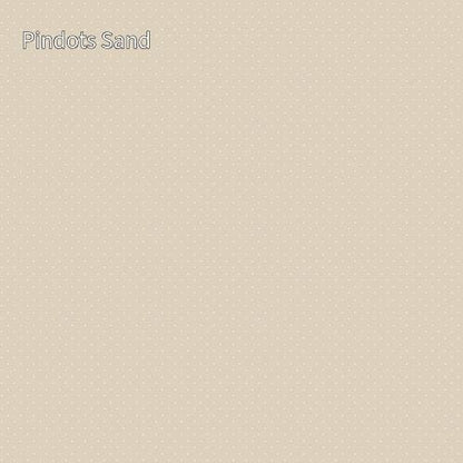 cotton fabric basics_solid_color_beige /sand _background_with_white_dots