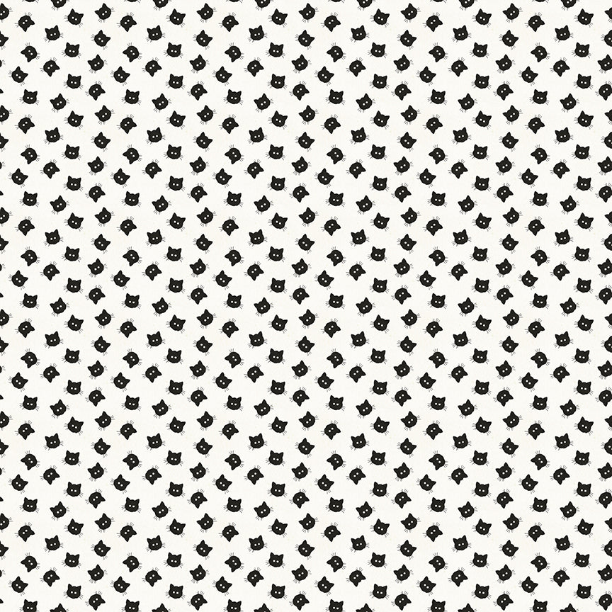 cotton fabric Pattern of small black cat faces on a white background 