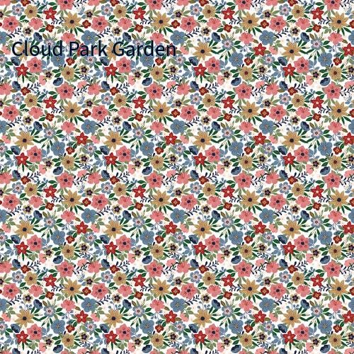 cotton fabric collection spoonful of sugar this one is a repeating pattern of small flowers in shades of blue, gold, white, and green on a white background called "Cloud Park Garden" The floral design is dense and covers the entire surface.