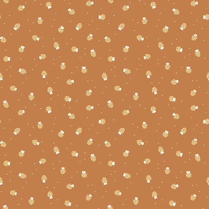 Cotton fabric faraway kingdom fairy tale collection pattern of scattered  mushrooms with spotted mushroom caps on a light brown / earth colored background