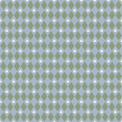 Cotton fabric faraway kingdom collection fairy tale harlequin pattern of green diamonds and dragons on a sky blue background