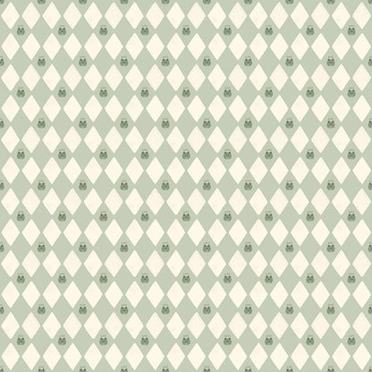 Cotton fabric faraway kingdom collection fairy tale harlequin pattern of light creme diamonds and dragons on a light green background