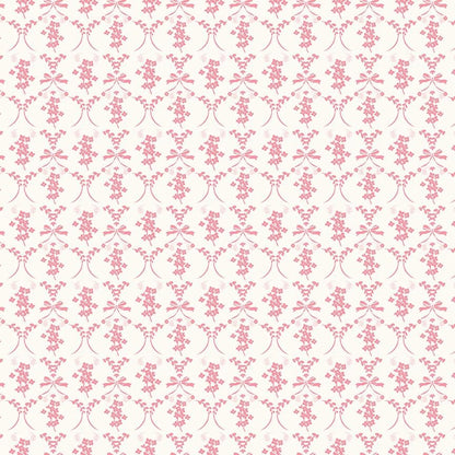 This flowers and bows cream pattern from The Sweet Pink collection by My Mind’s Eye for Riley Blake Designs is one of 3 patterns in the collection which feature a delicate, romantic pattern featuring ribbons and small flowers. This image has a blush colored background