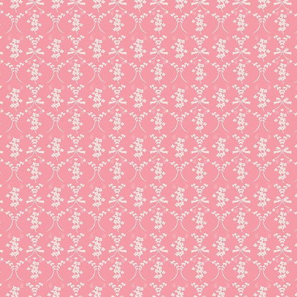 This flowers and bows pink pattern from The Sweet Pink collection by My Mind’s Eye for Riley Blake Designs is one of 3 patterns in the collection which feature a delicate, romantic pattern featuring ribbons and small flowers. This image has a blush colored background