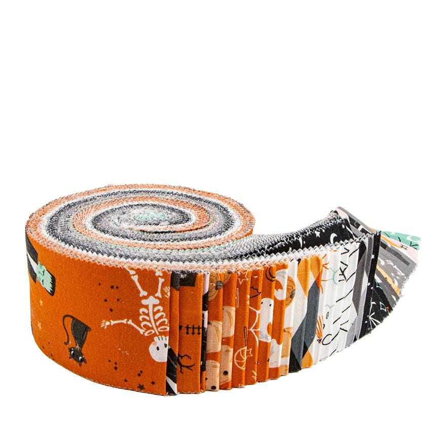 This Rolie Polie is a 2 1/2" strip precut bundle with 40 pieces from the Frank and Friends fabric collection by My Mind's Eye for Riley Blake Designs. The collection is a whimsical, "delightfully spooky" Halloween-themed collection featuring playful monsters, charming characters, and vintage-inspired designs. The collection uses a unique palette of orange, charcoal, blush, mint, and ghostly gray, with many black fabrics featuring glow-in-the-dark elements2