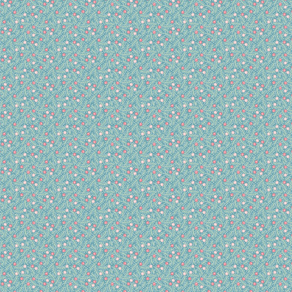 In the Frost & Flurry fabric collection by Sheri McCulley (for Poppie Cotton), the “Frosted Berries” prints are designed to capture a soft, wintry version of classic holiday berry motifs. The design features small, scattered berries attached to delicate branches, arranged in an allover, tossed layout rather than formal repeats. Background is icy blue