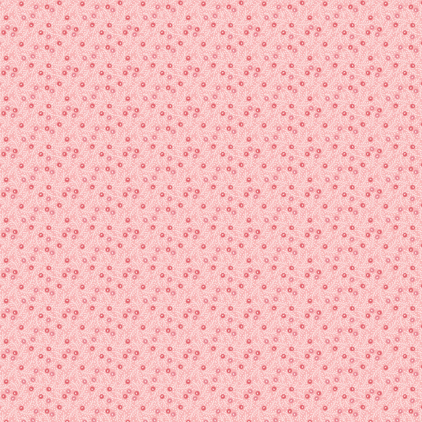 In the Frost & Flurry fabric collection by Sheri McCulley (for Poppie Cotton), the “Frosted Berries” prints are designed to capture a soft, wintry version of classic holiday berry motifs. The design features small, scattered berries attached to delicate branches, arranged in an allover, tossed layout rather than formal repeats. Background is pink