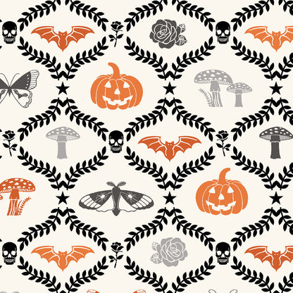 goth gardens fabric collection, this one is a repeating pattern featuring Halloween-themed illustrations. The design includes orange bats, jack-o'-lanterns, skulls, mushrooms, roses, and moths, set against a cream background. The elements are framed by a black leaf pattern.