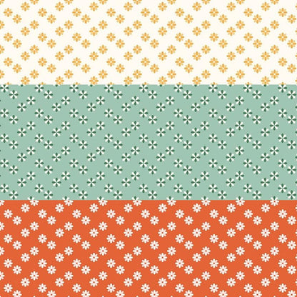 cotton fabric meadow moments collection three patterns with small daisies on white green and rust colored  backgrounds