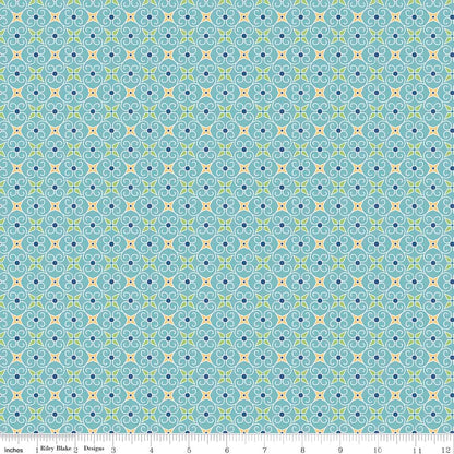 Pattern Wrapping Paper: A geometric, interlocking gift box and ribbon pattern with backgrounds: Blue, Green, and Yellow from the Cozy Christmas collection by Lori Holt for Riley Blake Designs is a vintage-inspired holiday line. It features festive motifs like snowmen, reindeer, recipes, and seasonal florals, typically produced in bright traditional colorways.