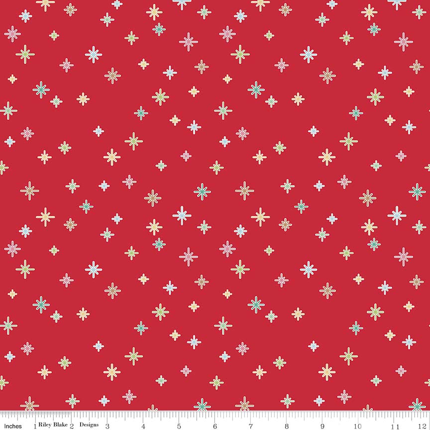 Pattern Sparkle is a dense, scattered background pattern of small twinkling stars and sparkles with backgrounds: Mint, Red, and White from the Cozy Christmas collection by Lori Holt for Riley Blake Designs is a vintage-inspired holiday line. It features festive motifs like snowmen, reindeer, recipes, and seasonal florals, typically produced in bright traditional colorways.