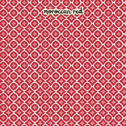100% cotton fabric collection Radiant Ruby. The pattern features a repeating Moroccan-inspired tile motif in a vibrant red set against a "cloud" white background. Collection is a vibrant "showstopper in scarlet" a two-tone collection which uses only "Schoolhouse" (red) and "Cloud" (off-white) to create a striking aesthetic inspired by the brilliance of a ruby gemstone.  