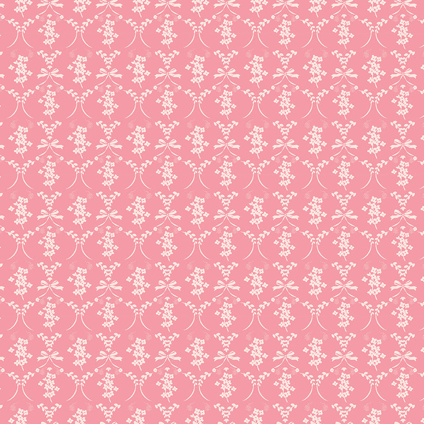This flowers and bows pink pattern from The Sweet Pink collection by My Mind’s Eye for Riley Blake Designs is one of 3 patterns in the collection which feature a delicate, romantic pattern featuring ribbons and small flowers. This image has a pink colored background